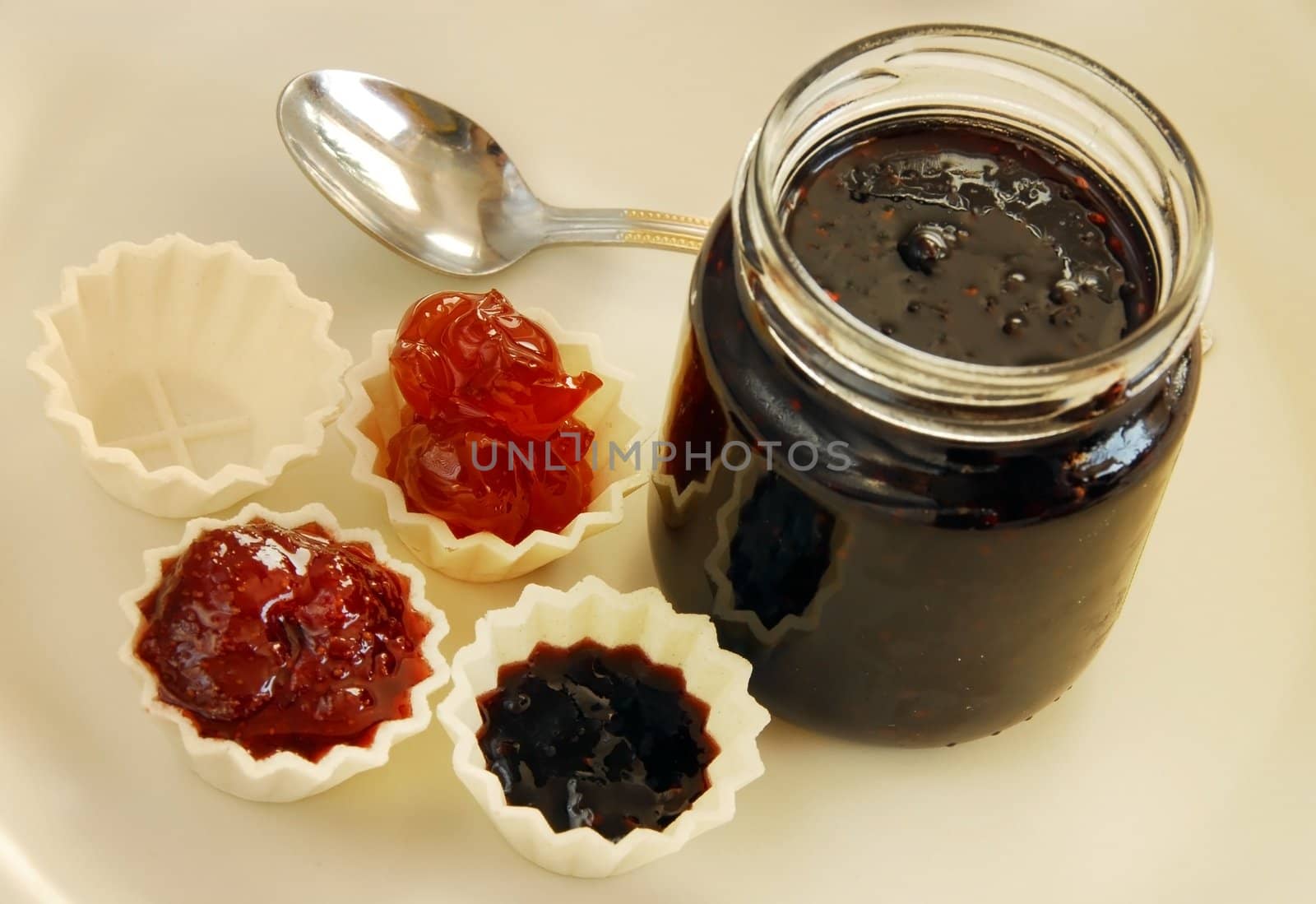 preserves,  jam in small edible treats and glass jar