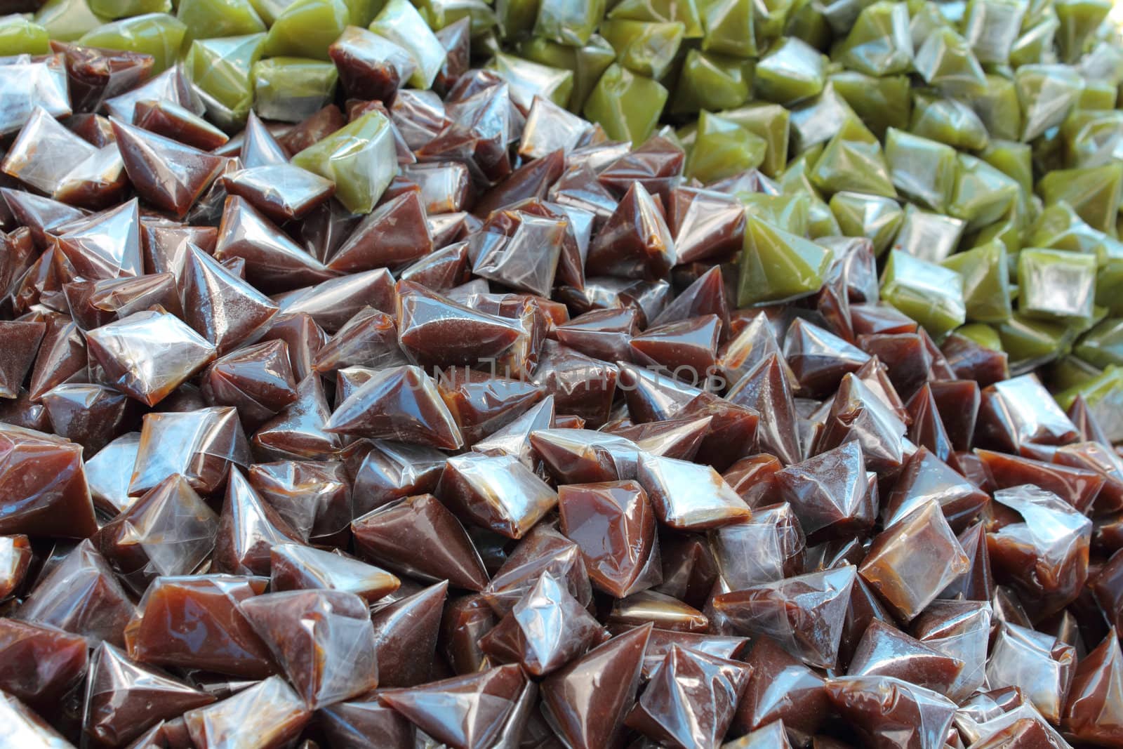 Background of Thai dessert made from flour and sugar in triangle package