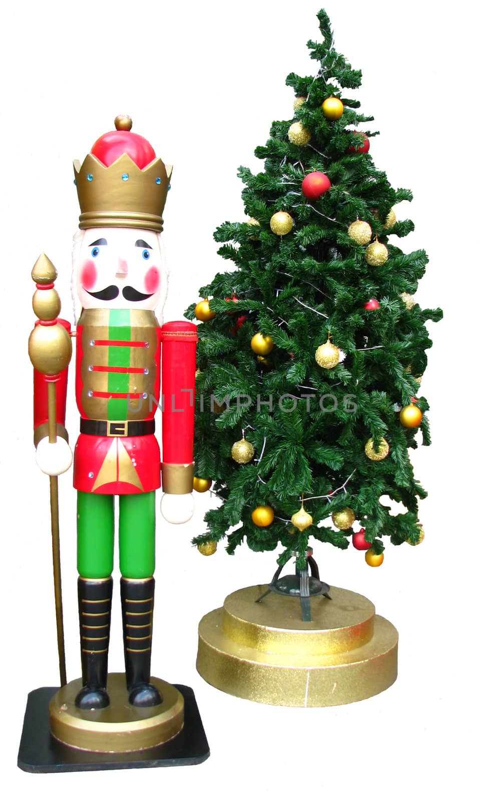 King toy and Christmas Tree with balls on white background 