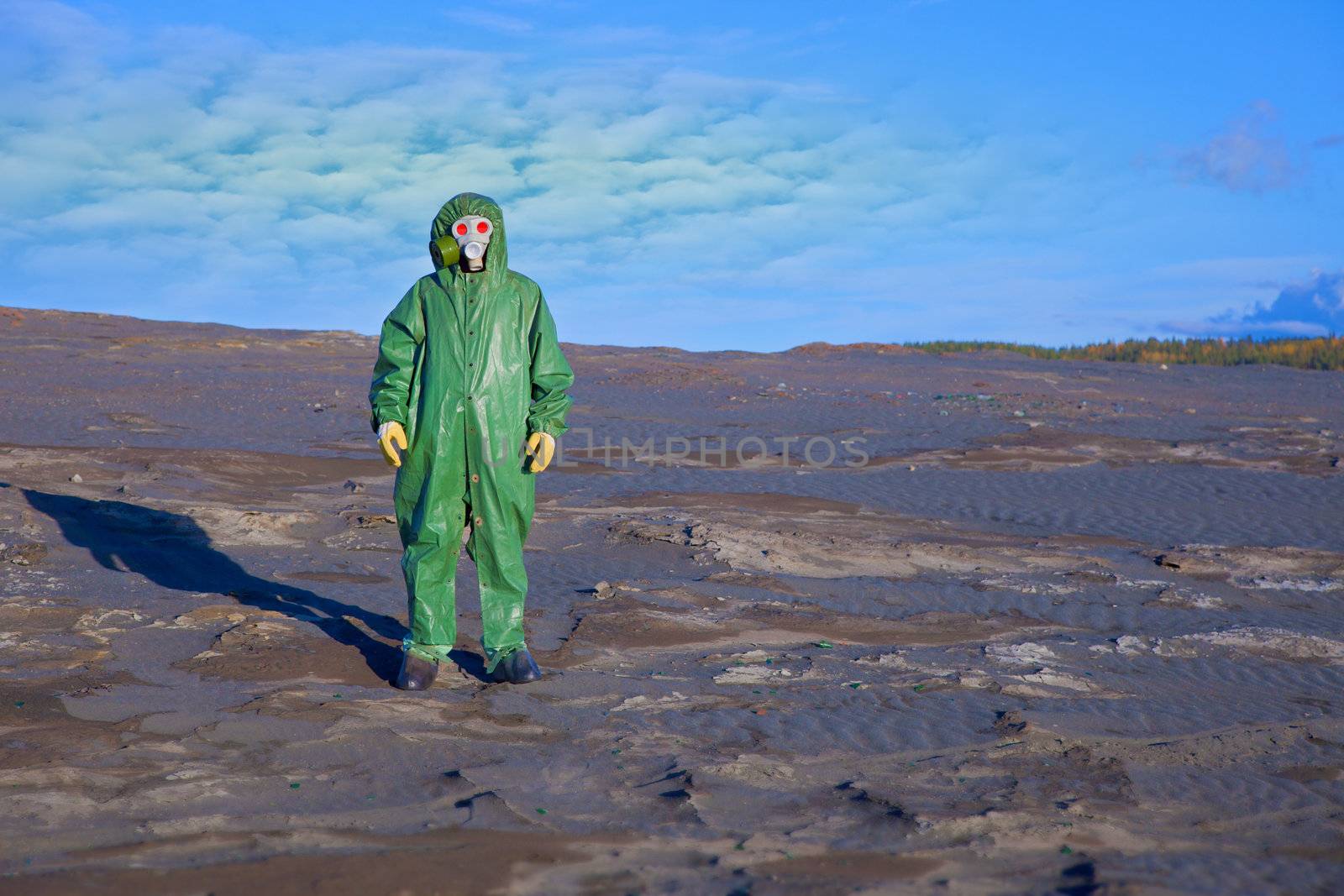 Environmental scientist in the zone of ecological disaster, like a ghost