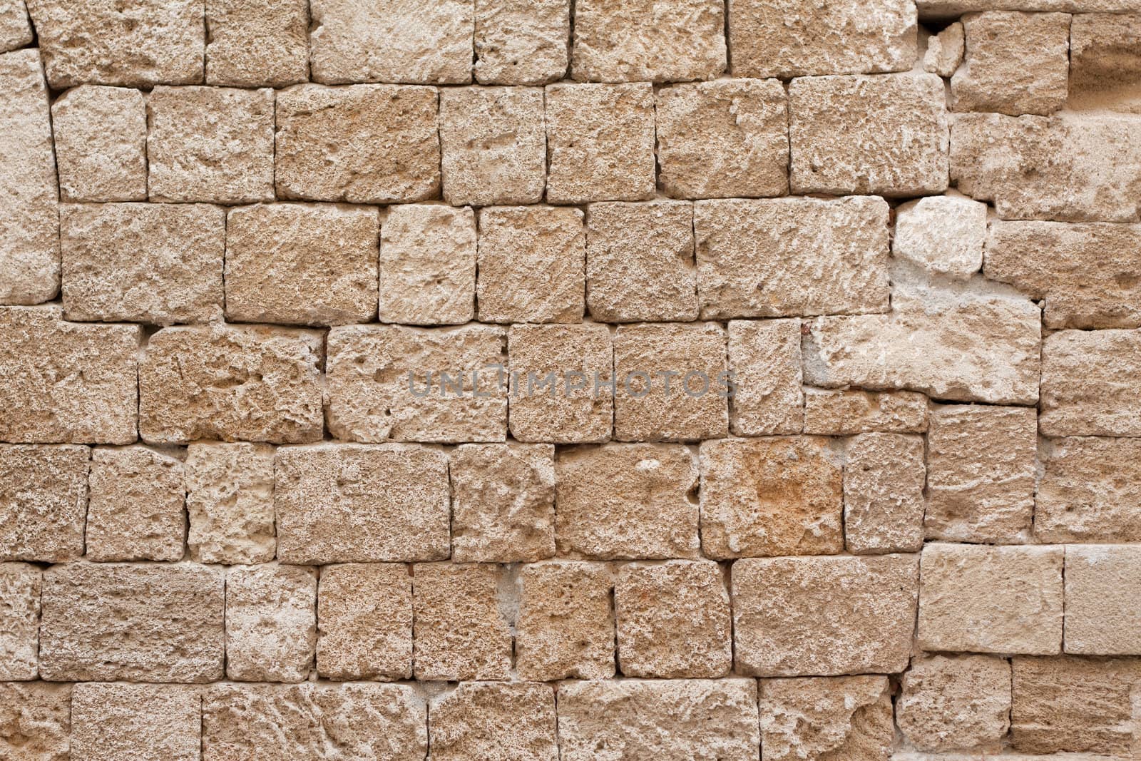 Medieval stone facade in Ippoton (Street of the Knights) in Rhodes Old Town (a Unesco World Heritage Site) in the Dodecanese island of Rhodes, Greece.