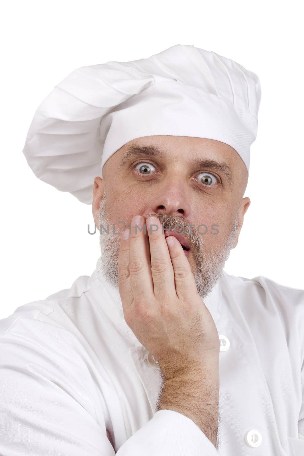 Portrait of a scared chef on white.