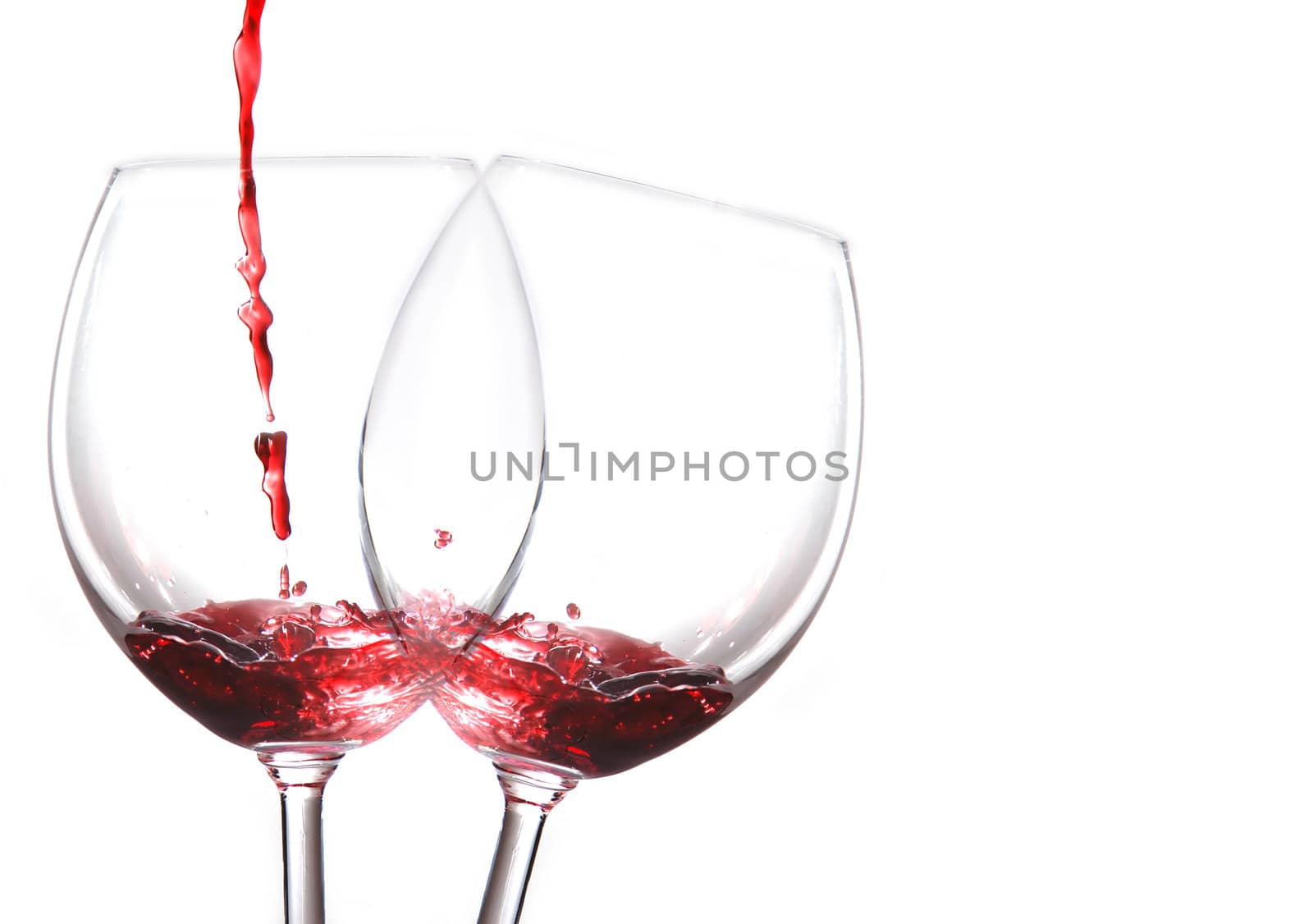 Pouring wine isolated on white background