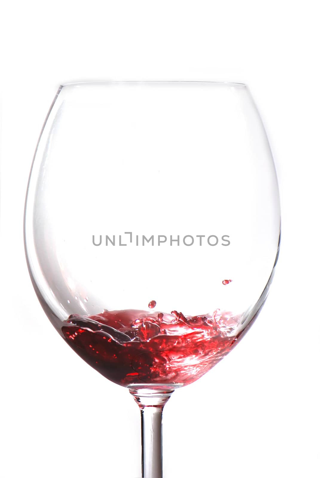 Red wine isolated on white background