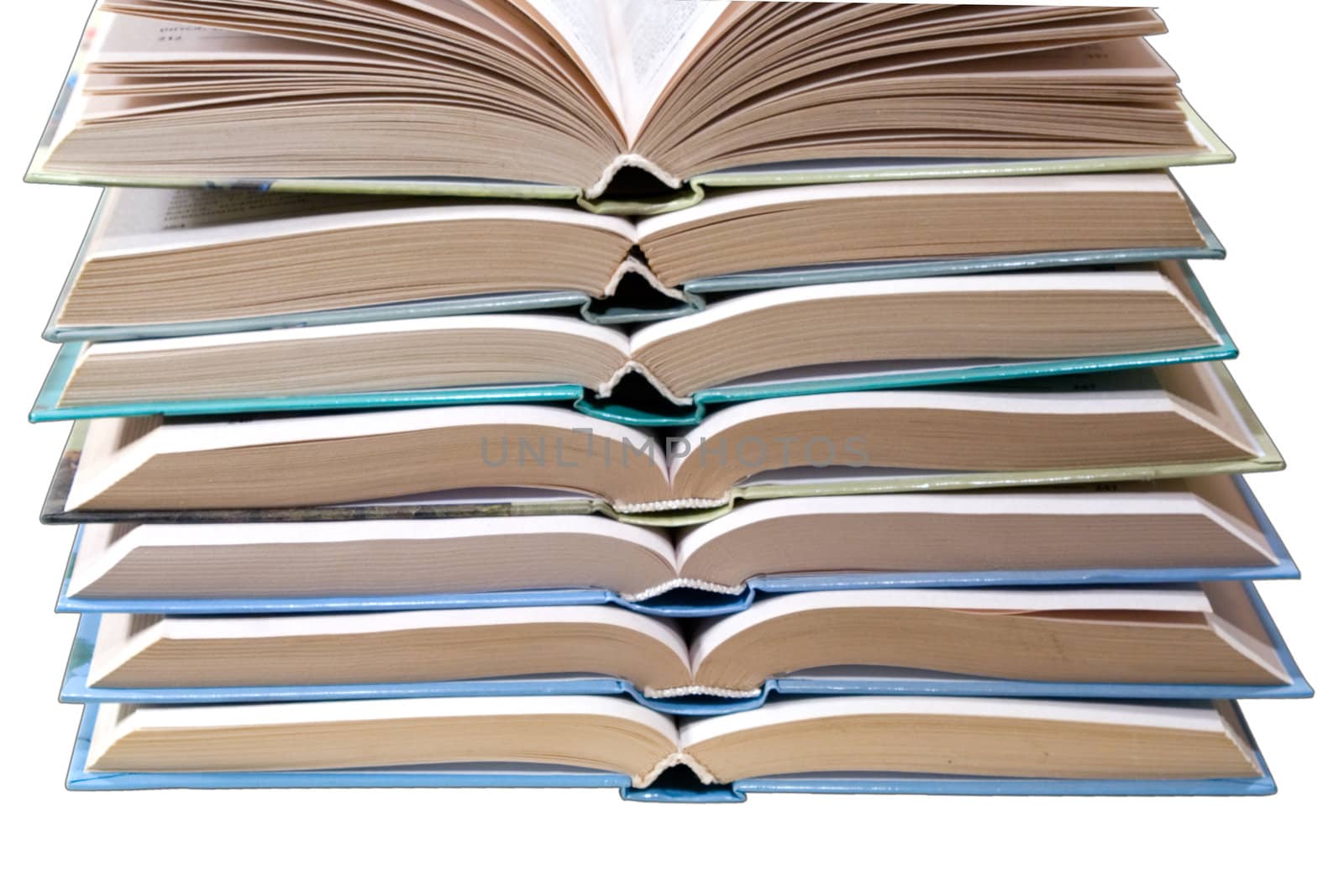 opened books, stacked on a white background
