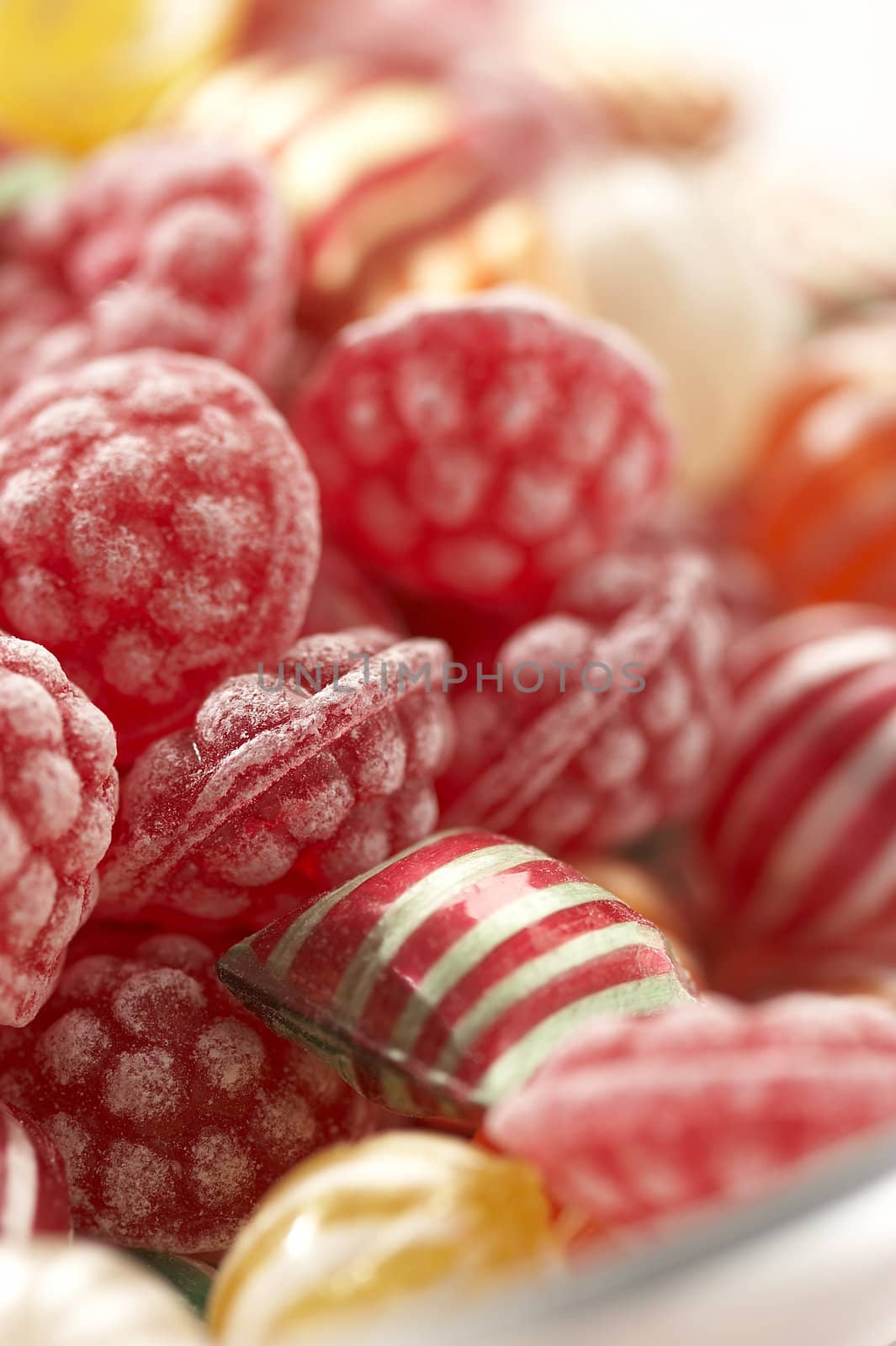 macro veiw of red raspberry's shaped fruit-drop