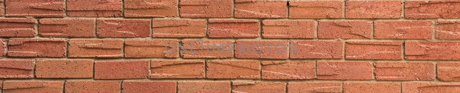 Simple large panoramic red brick wall