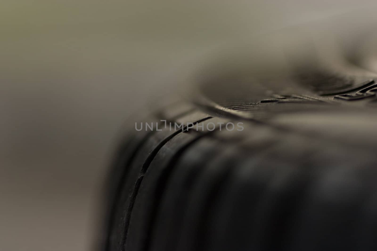 Close-up of a car tire utilizing a very small depth of field.