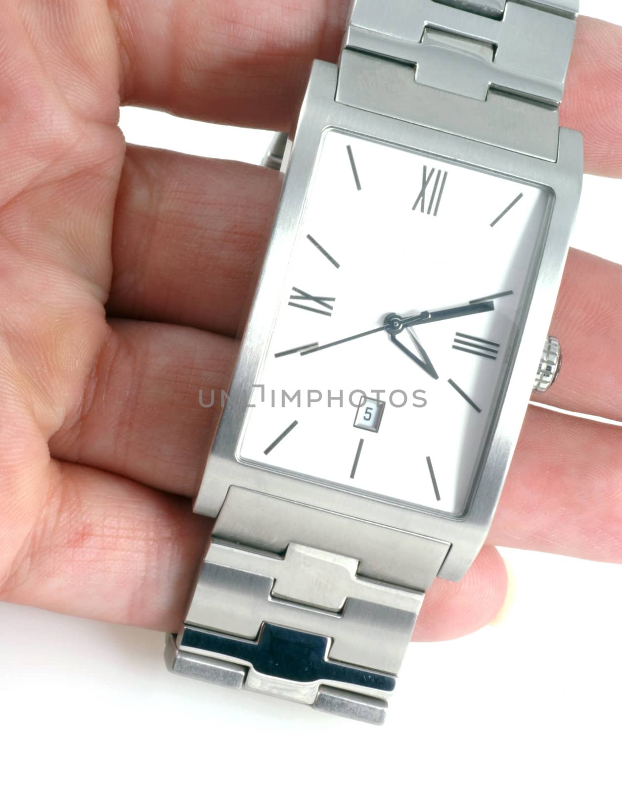 Hand holding up a watch isolated on a white background.