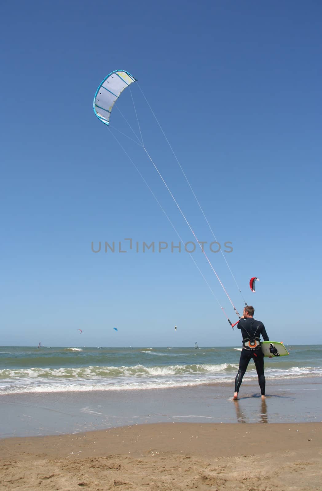 Kite surfer about to enter the surf