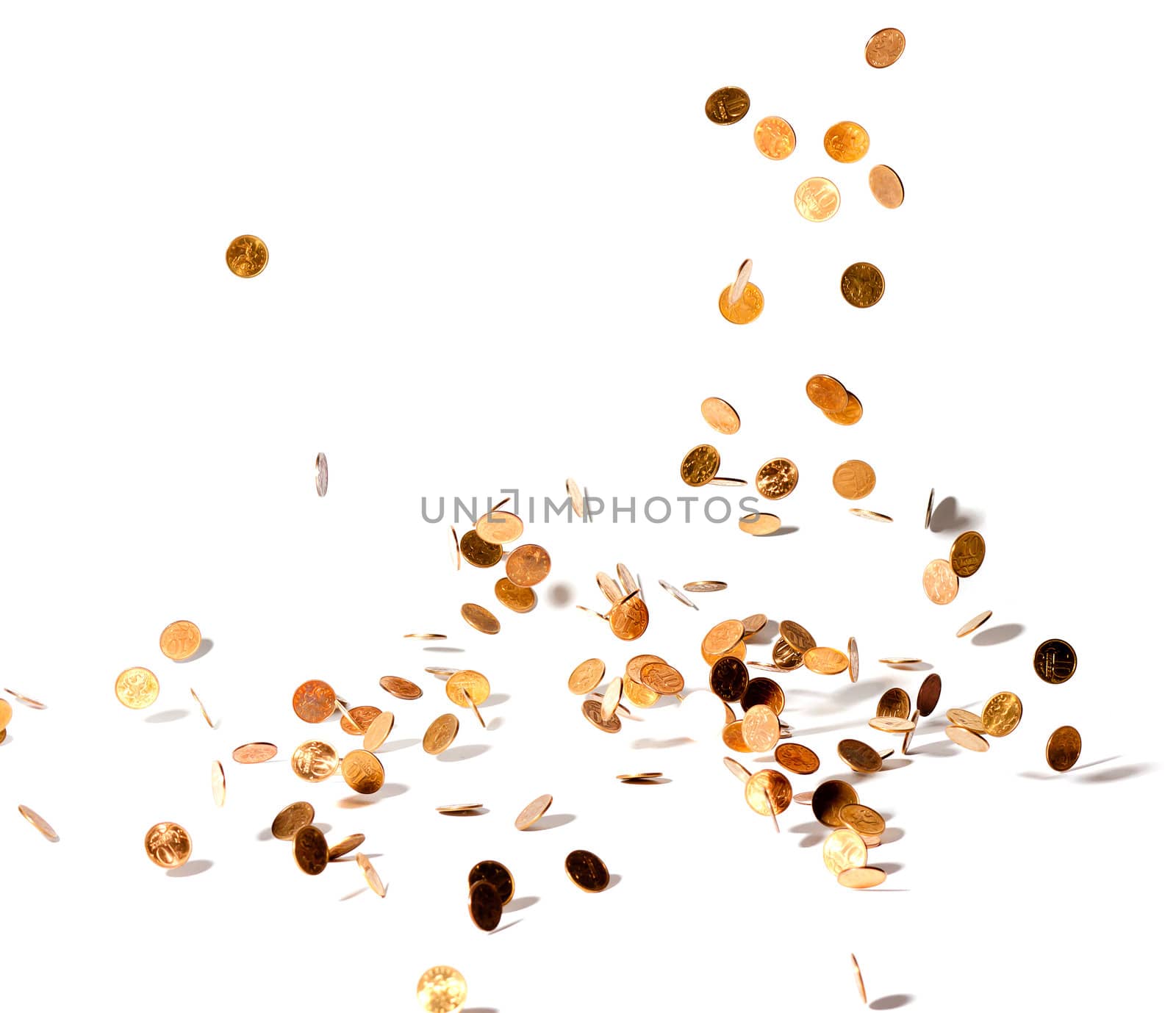 photo of coins falling on white background