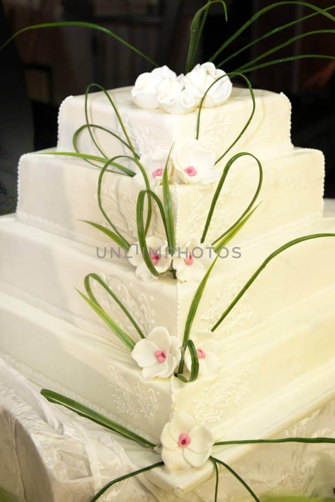 four-tiered wedding cake or birthday cake - decorated beautifully