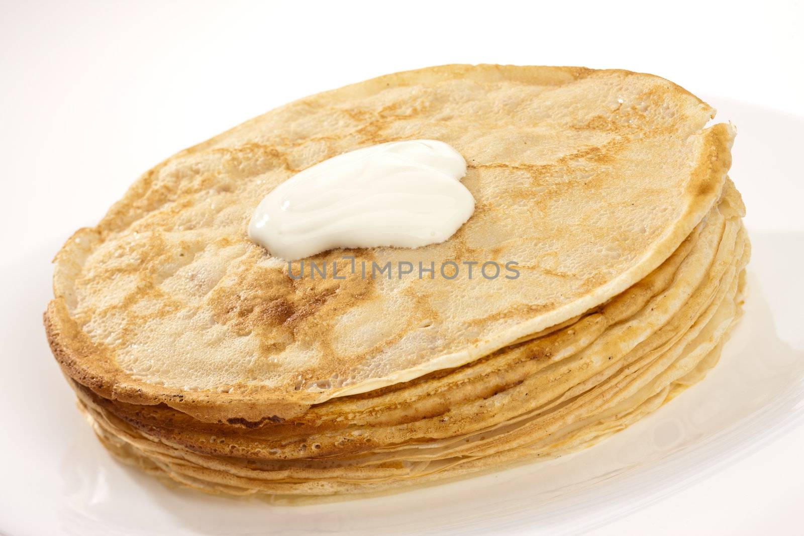 food series: tasty hot pancake with sour cream