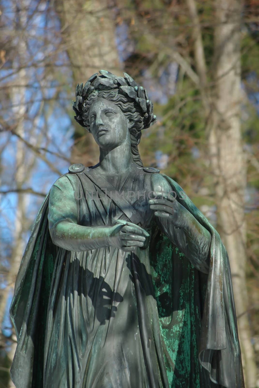 Statue of the muse of poetry in park of Pavlovsk, Saint-Petersburg, Russia