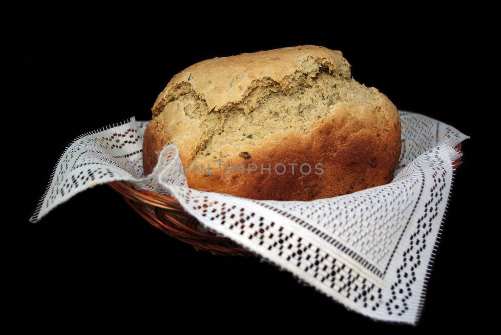 Loaf of bread in basket. by Vitamin