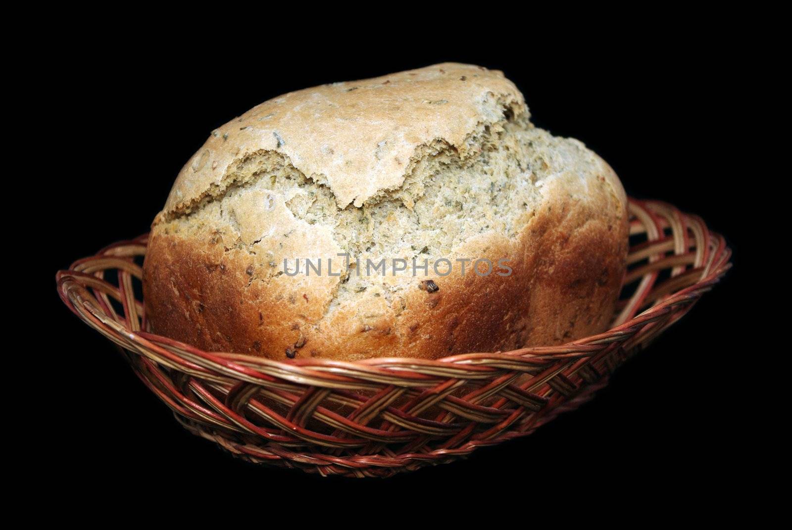 Loaf of bread in basket. by Vitamin