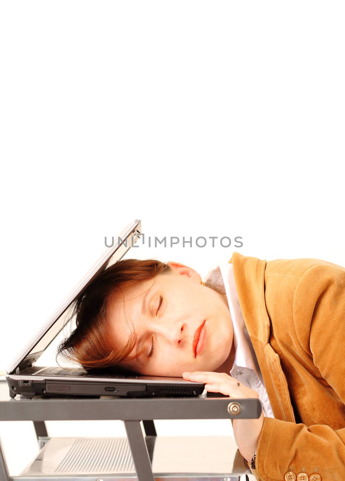 Young business woman sleeping on her laptop, isolated over white background  