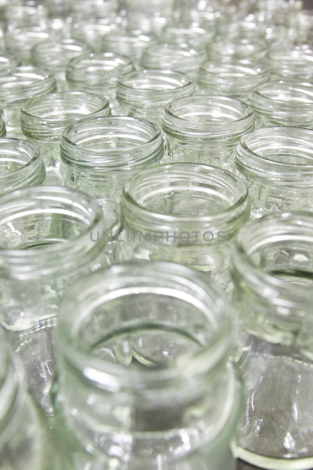 group of empty glass jar in factory