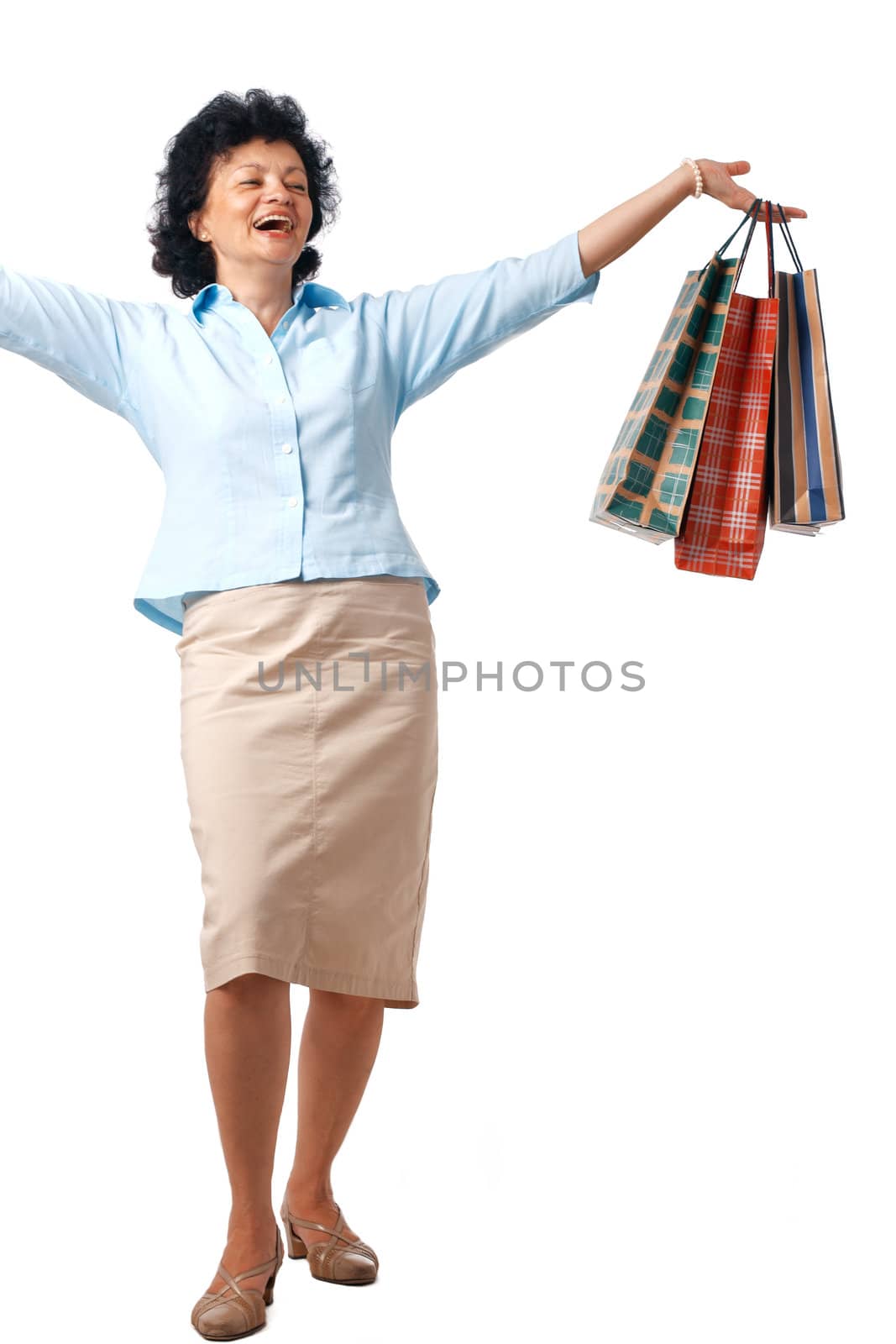 Senior Woman with shopping bags over white background.