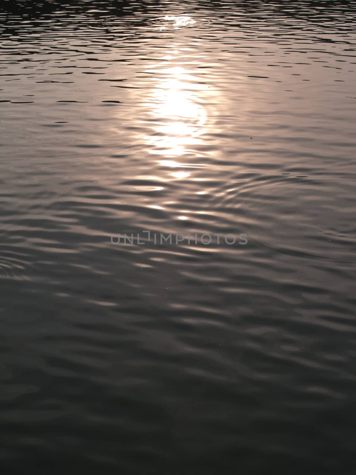 Abstract golden reflection on water with shapes texture