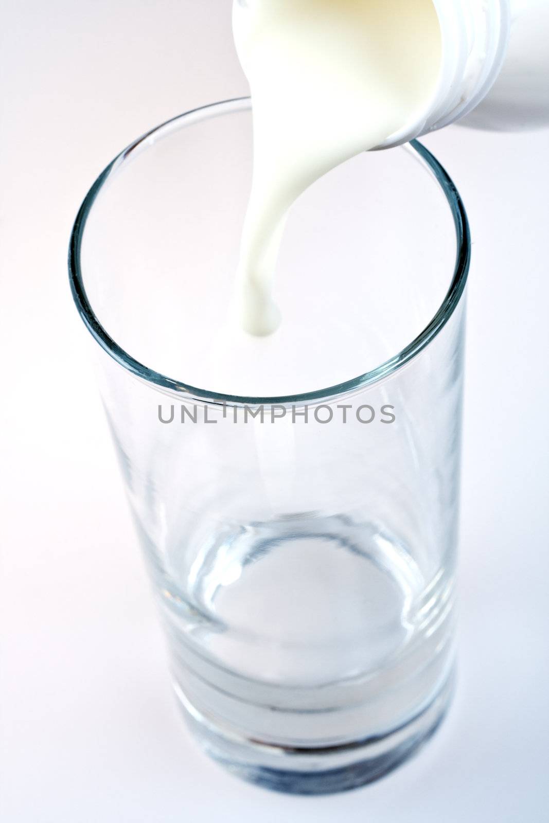 glass of milk with a bottle