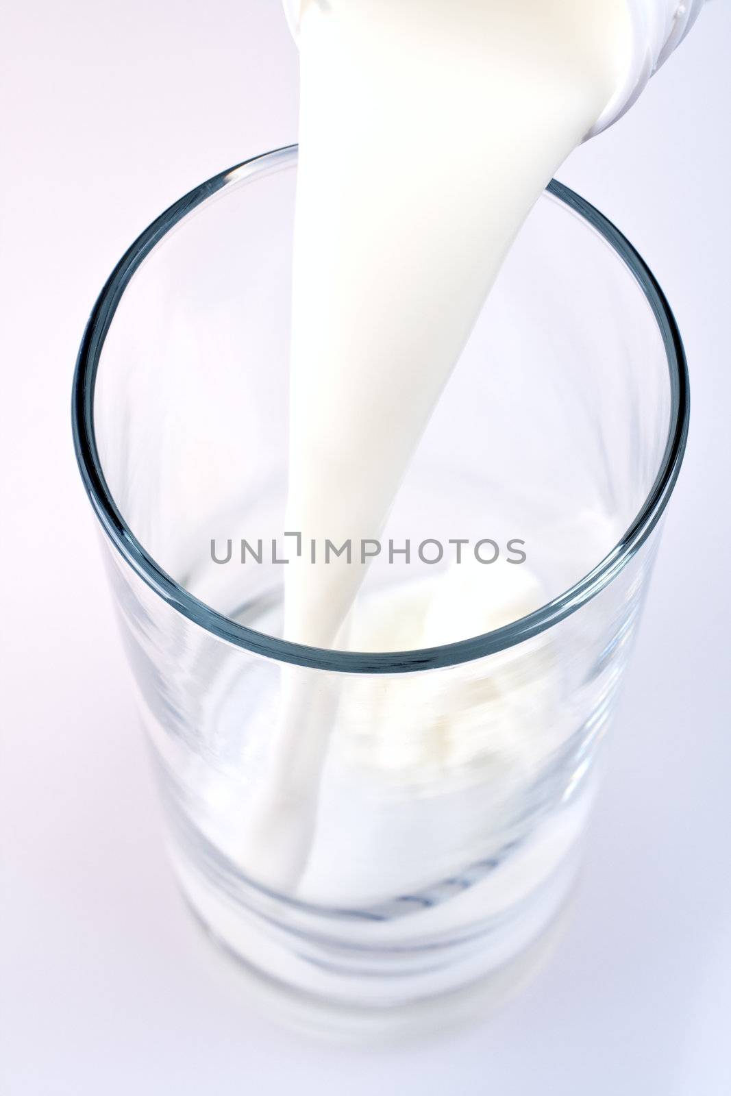 glass of milk with a bottle