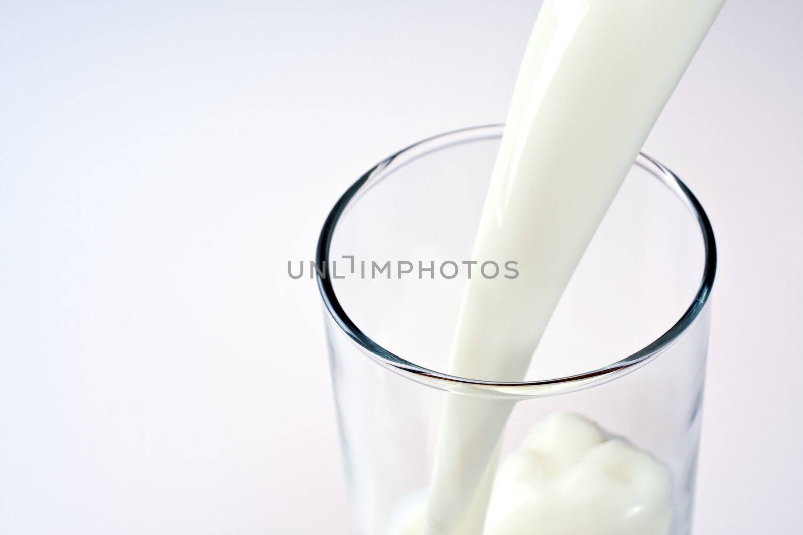 glass of milk with a bottle