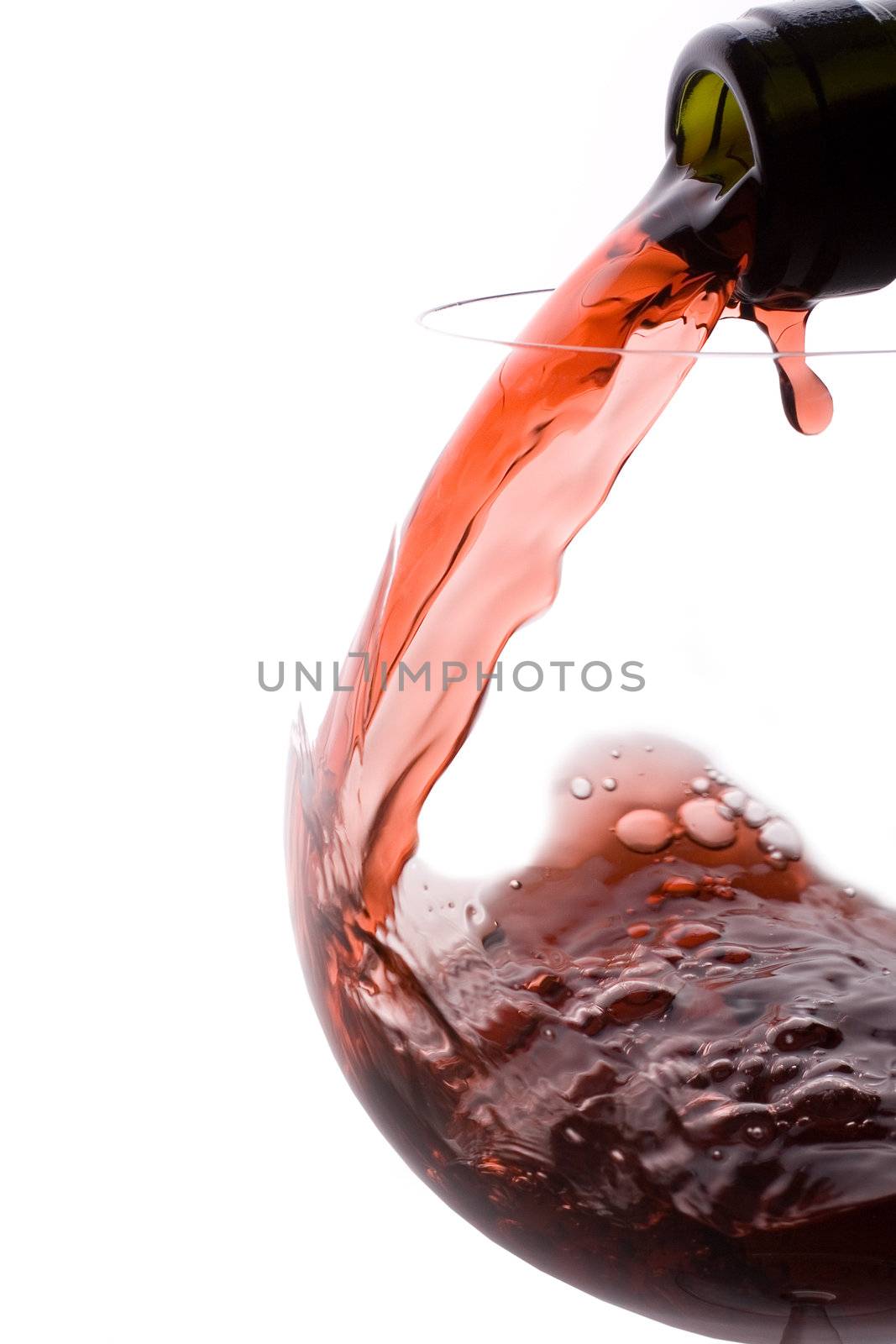 red wine flow in a transparent glass