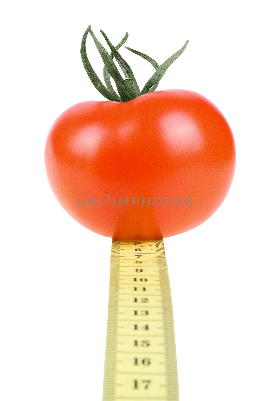 fresh Tomato with measuring tape on white background