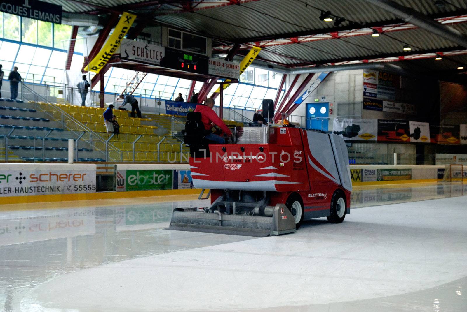 ZELL AM SEE, AUSTRIA - APRIL 30: Hockey world tournament. Bantam major final Black wings Linz (Austria) vs. Sokol-96 Kiev (Ukraine). Zamboni cleaning ice after the second period in the hockey rink of Zell am See, Austria in April 30, 2011.