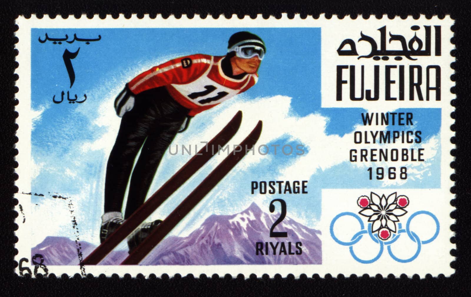 Postage stamp from Fujeira shows Winter Olympic Games in Grenoble 1968