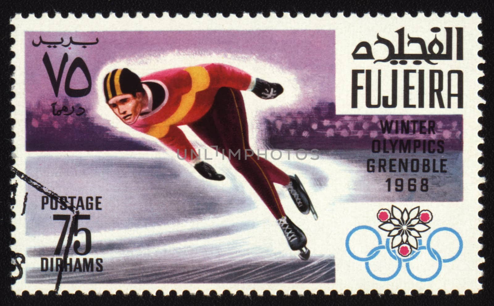 Fujeira - CIRCA 1968: A stamp printed in Fujeira shows Winter Olympic Games in Grenoble 1968. Skating