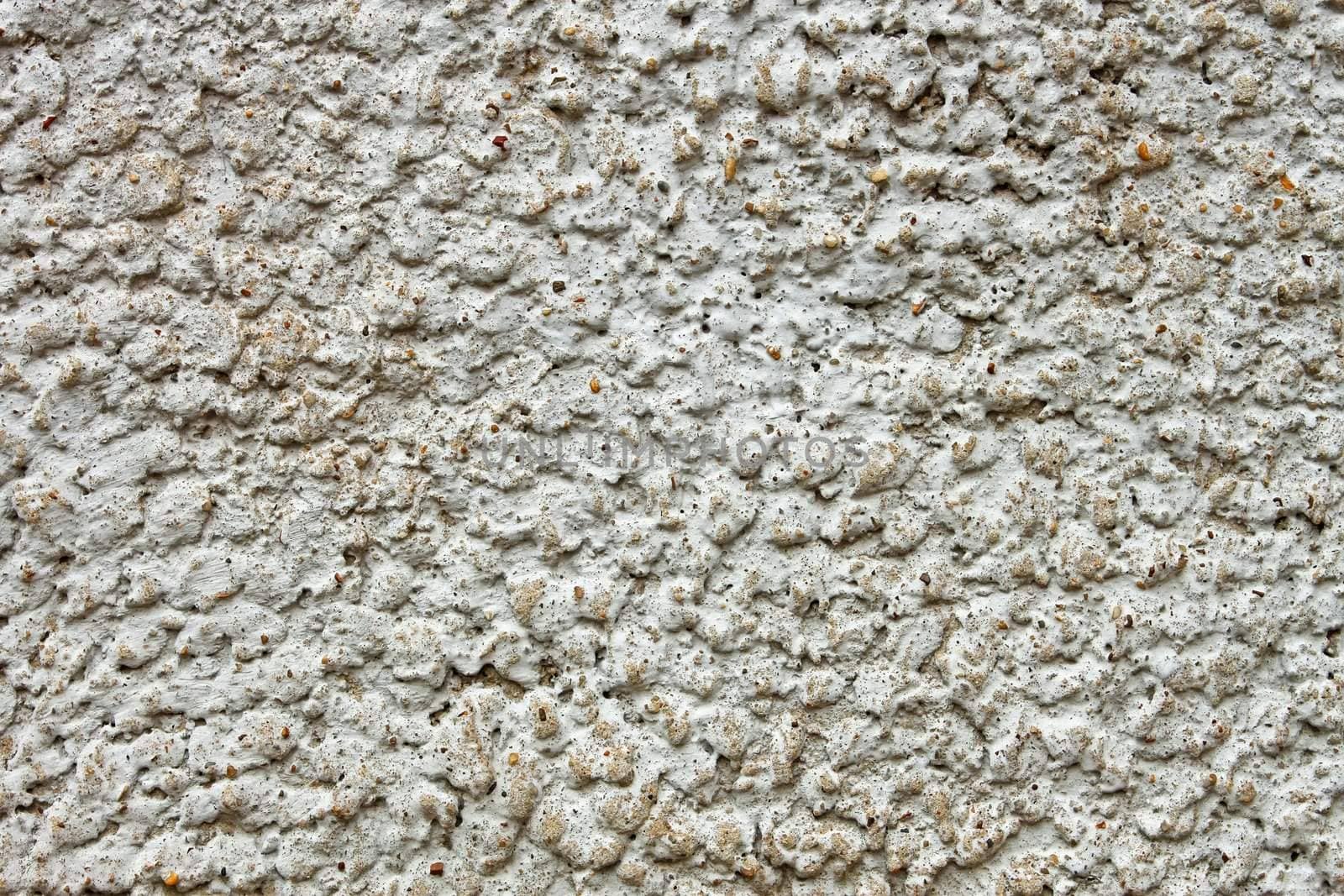 Relief concrete stucco wall covering. Macro shooting