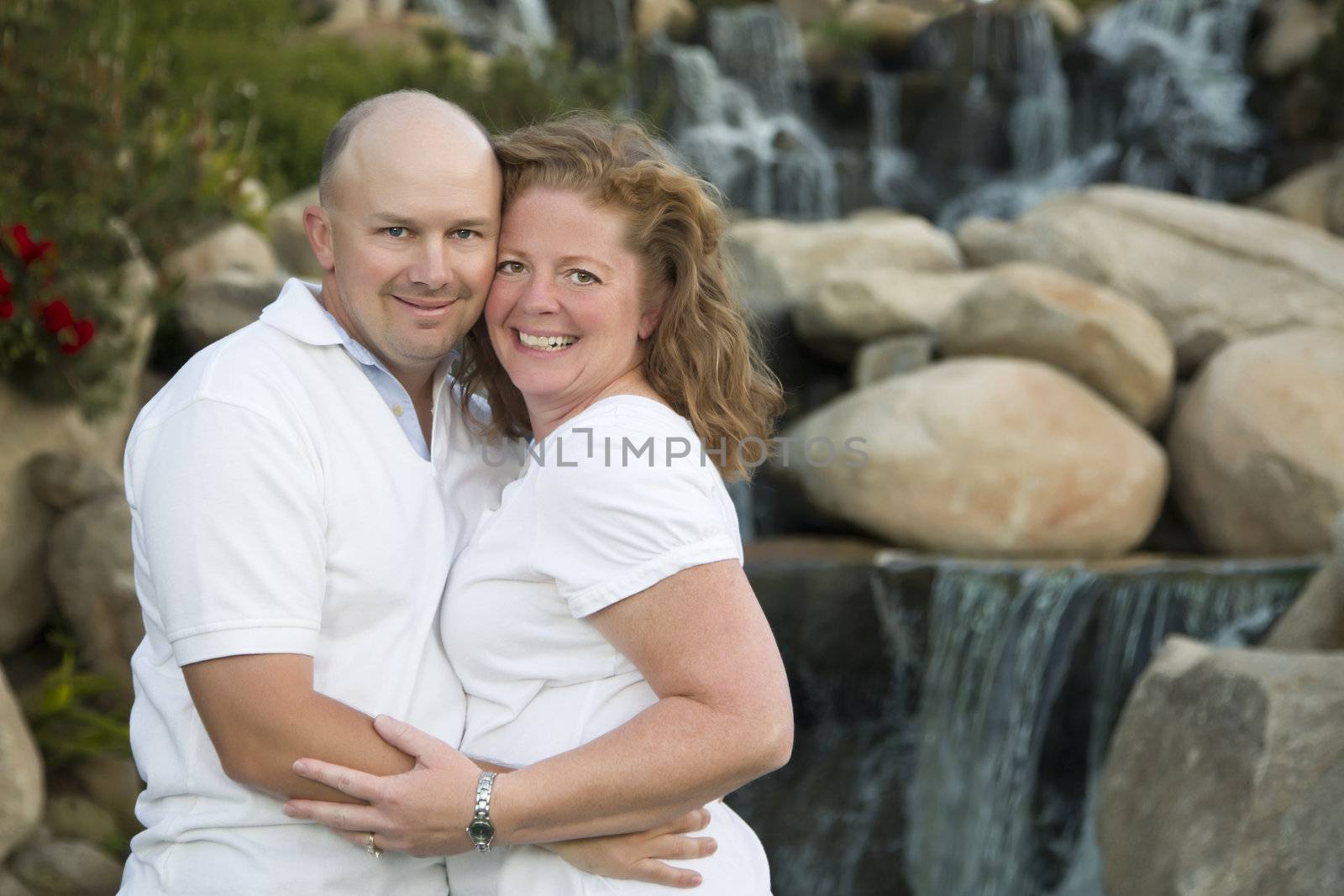 Attractive Couple Pose for Portrait in the Park.