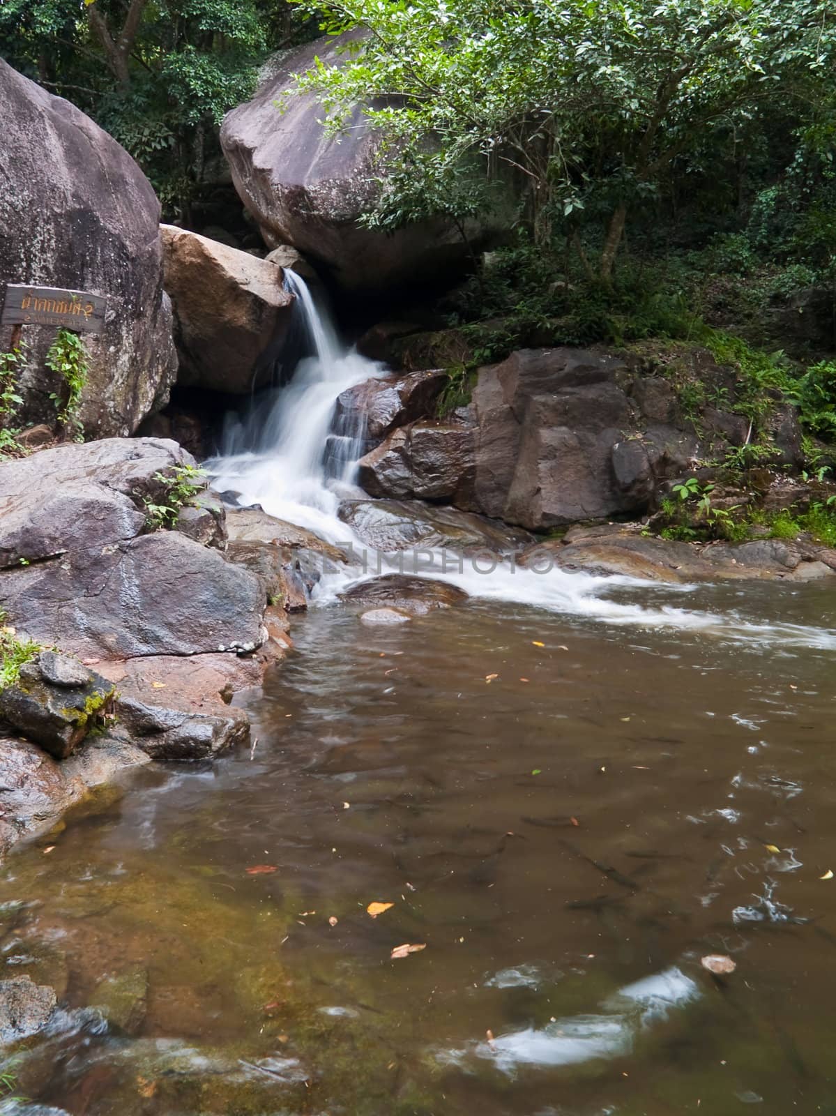 Second floor of Huai Yang waterfall with a lot of fish in beck, Huai Yang National Park, Prachuap Khiri Khan, Thailand