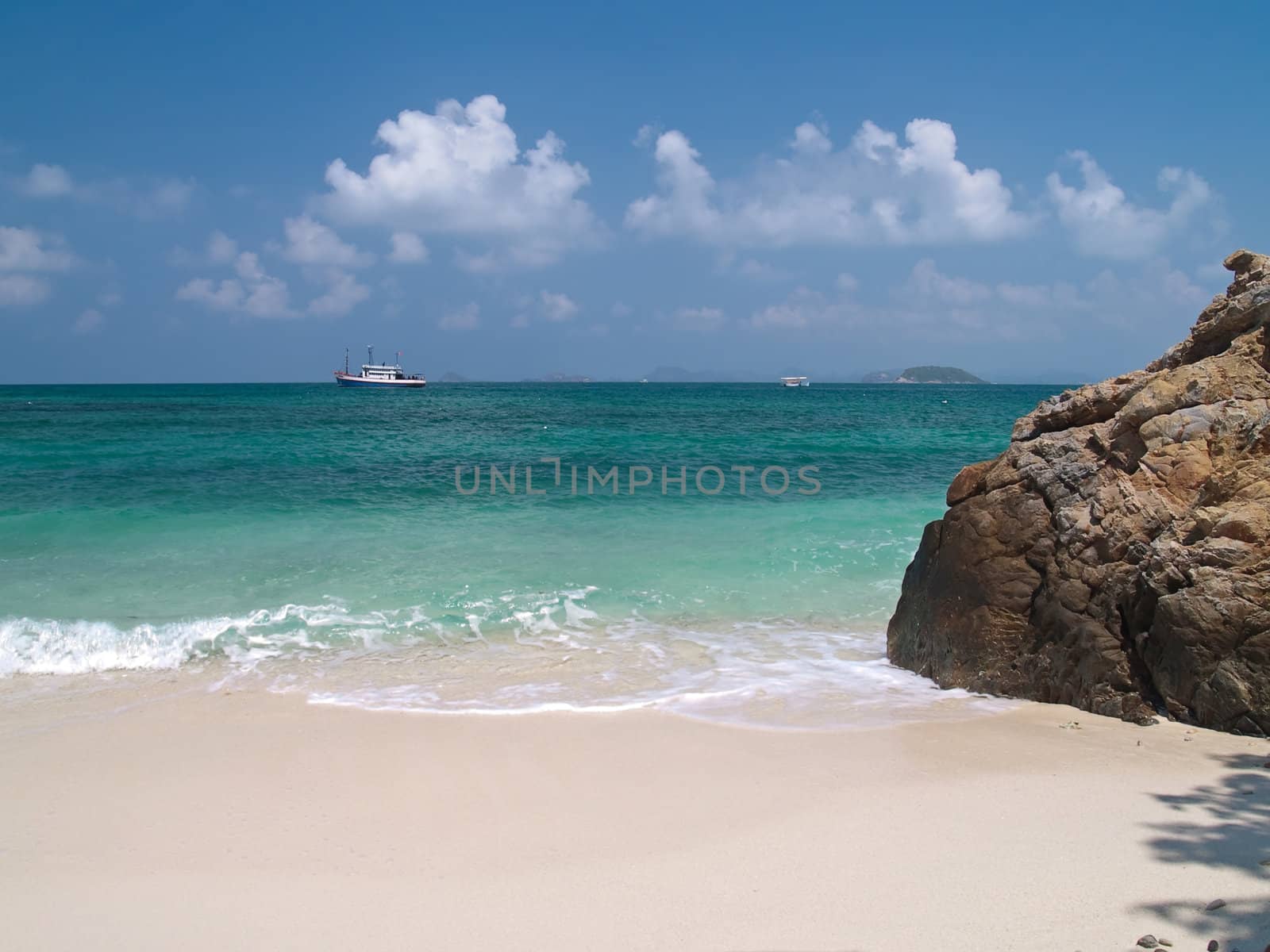 Beautiful beach with emerald color sea in Ko Kham island, Sattahip, Chon Buri, Thailand
