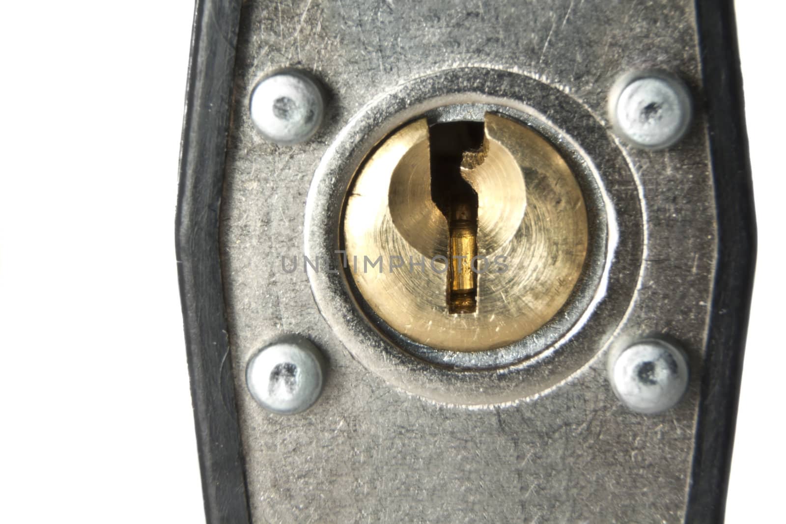 Closeup shot looking at a pin tumbler lock of a padlock