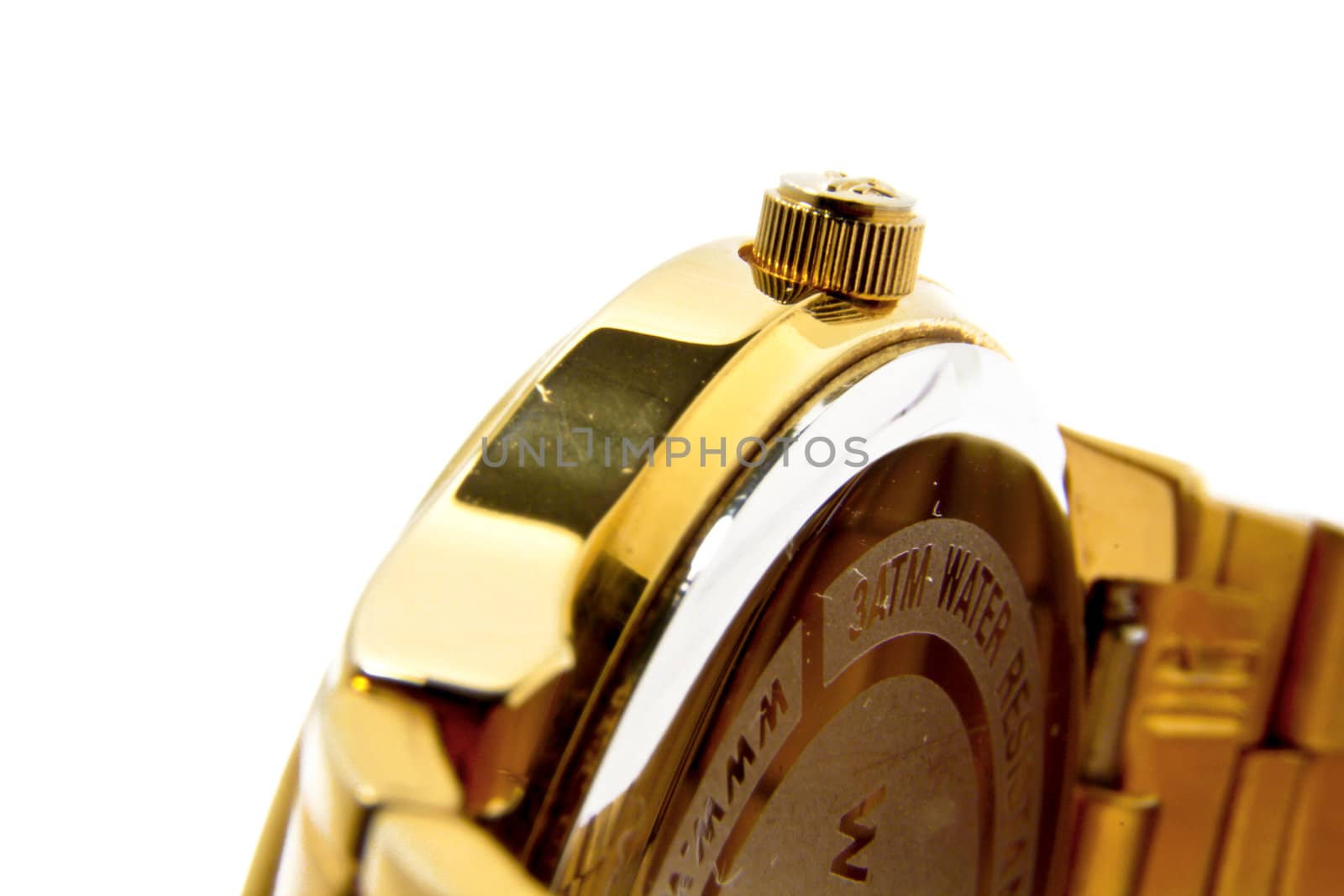 An elegant stylish golden mens wrist watch isolated on a white background