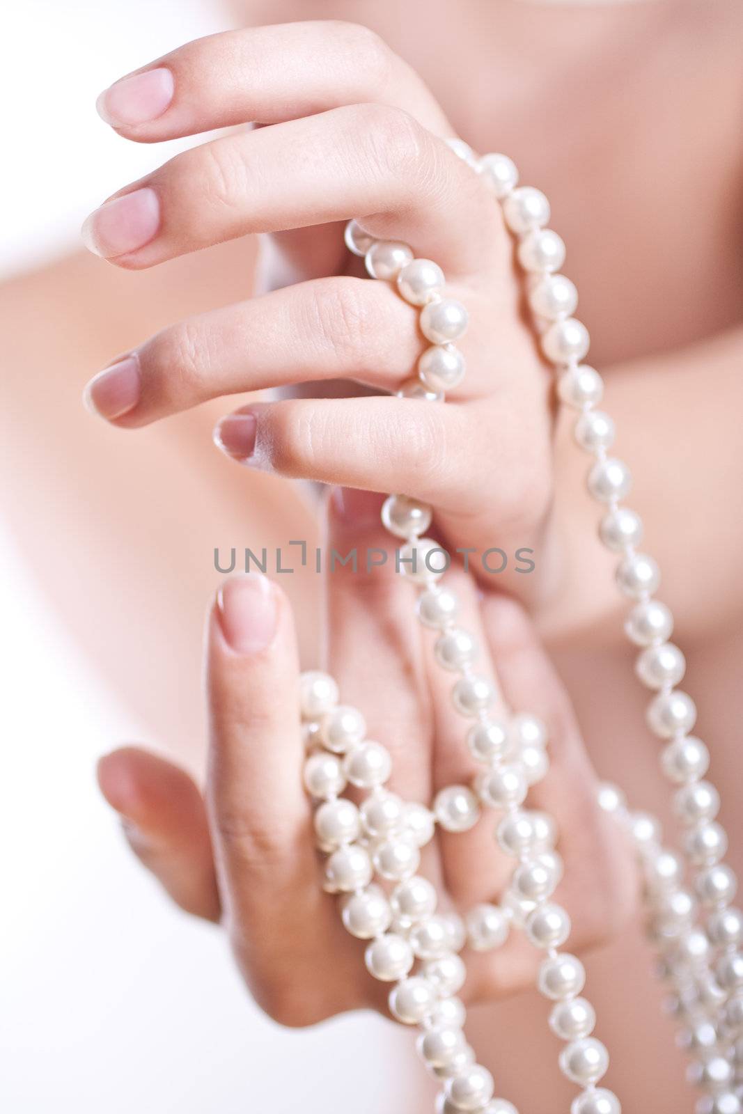 pearls in the women's hands by Lupen