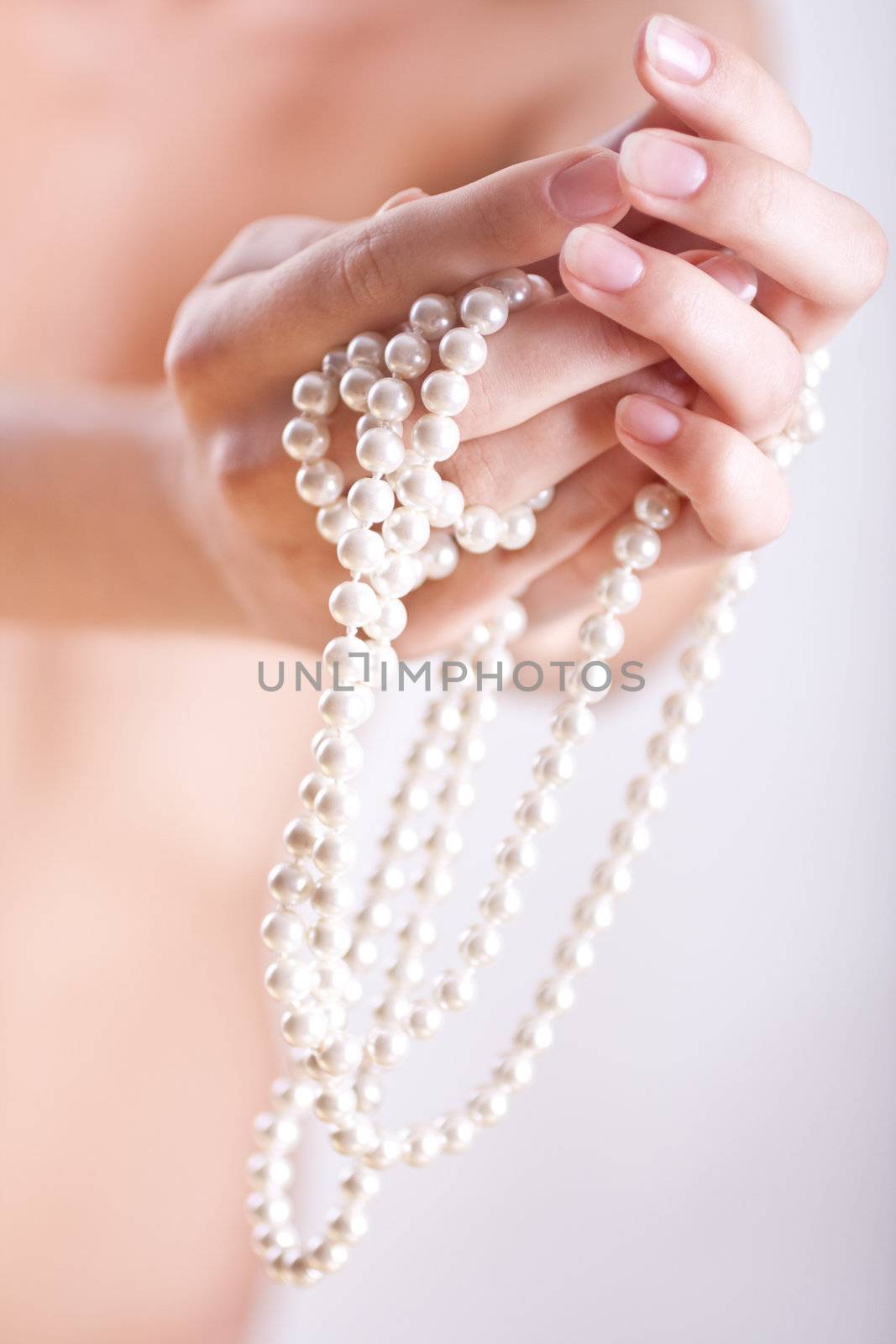 pearls in the women's hands by Lupen