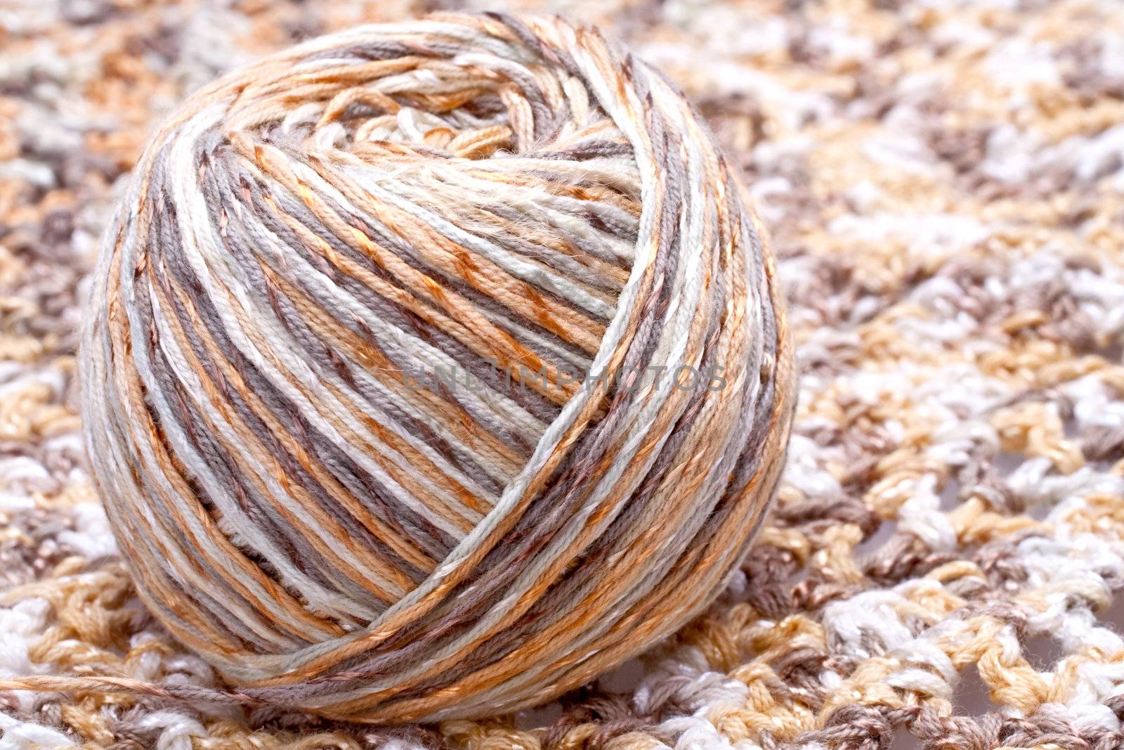 striped beige tangle of yarn as a background