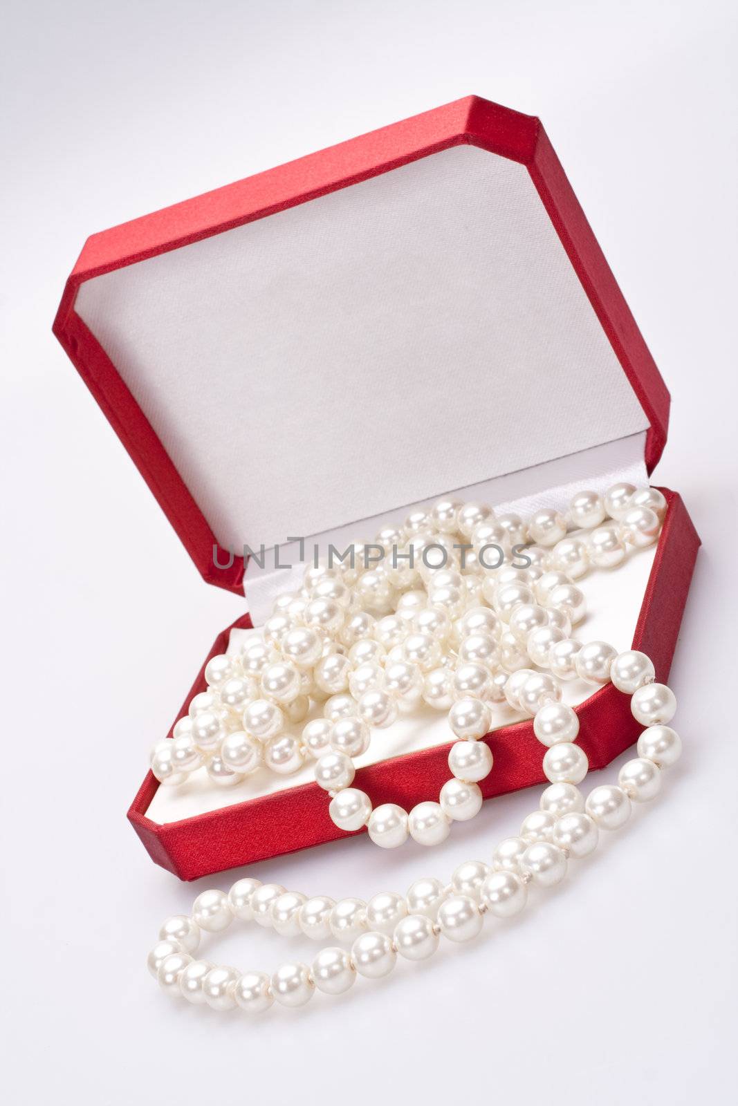 pearls in a red box by Lupen