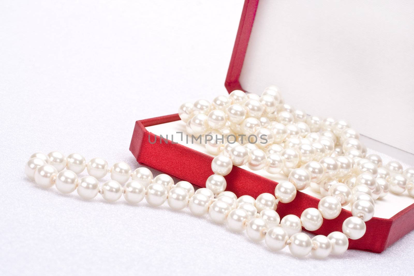 pearls in a red gift box 