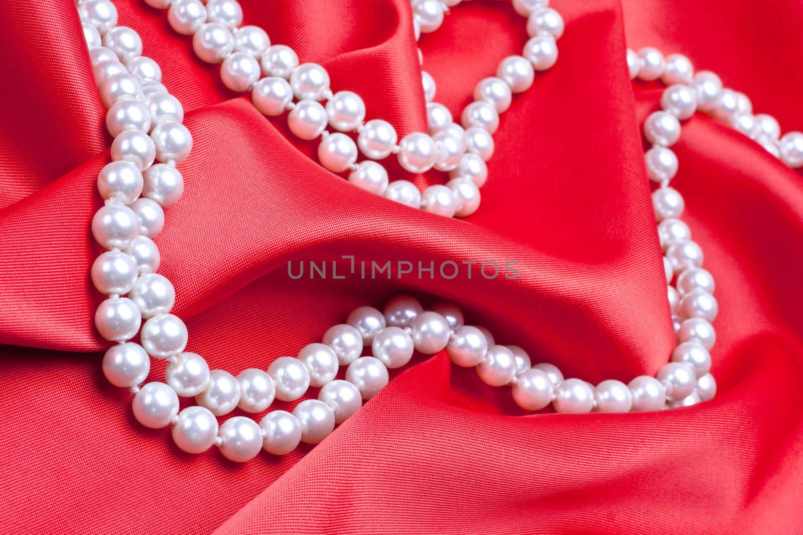 jewels on white satin as a background