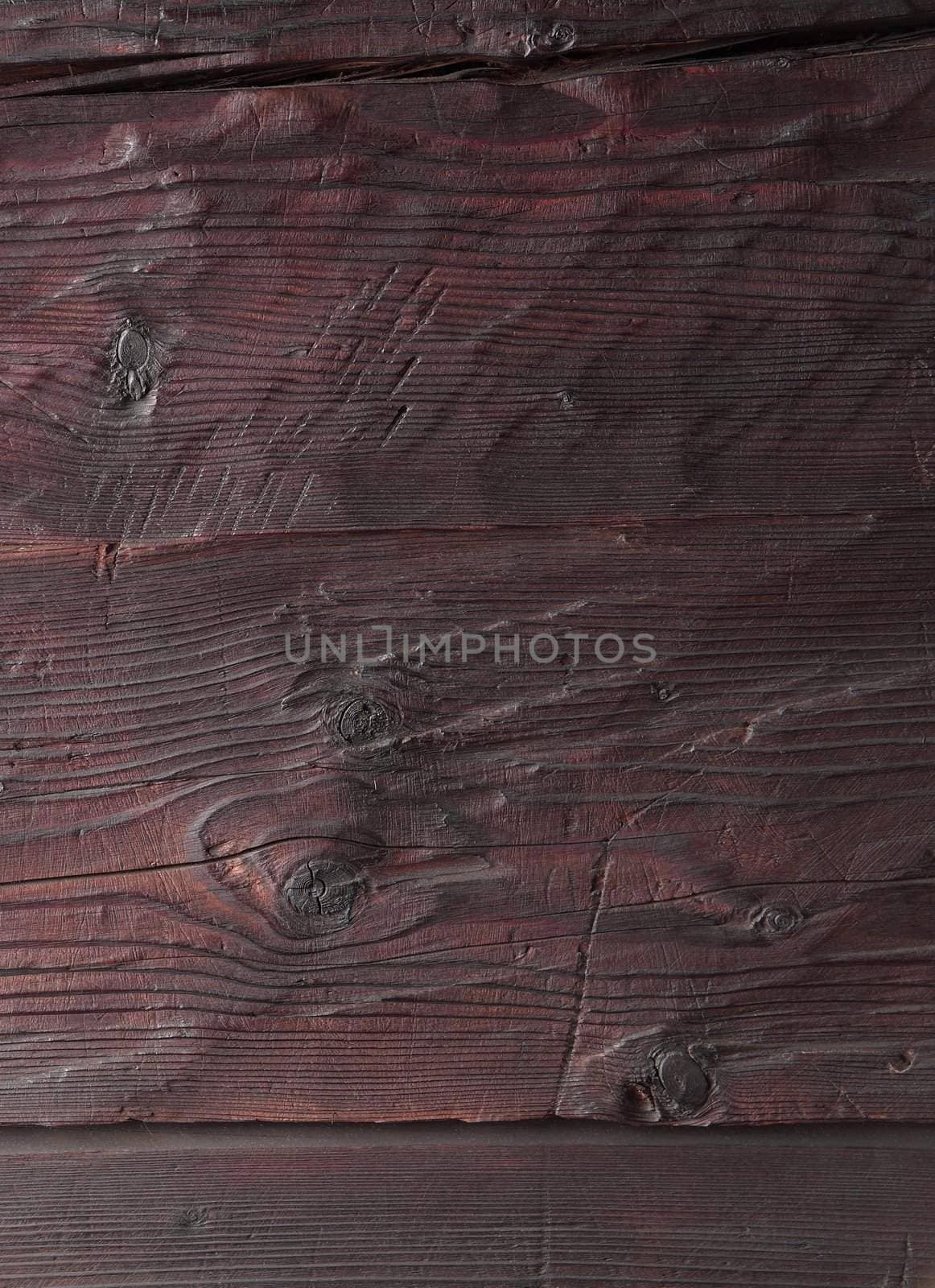 From seventeen century hard wooden planks with knots.