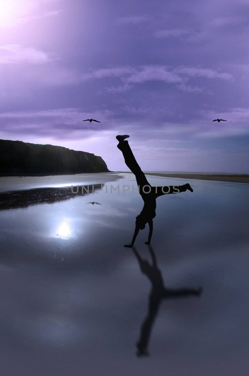 a young woman exercising on an isolated irish beach