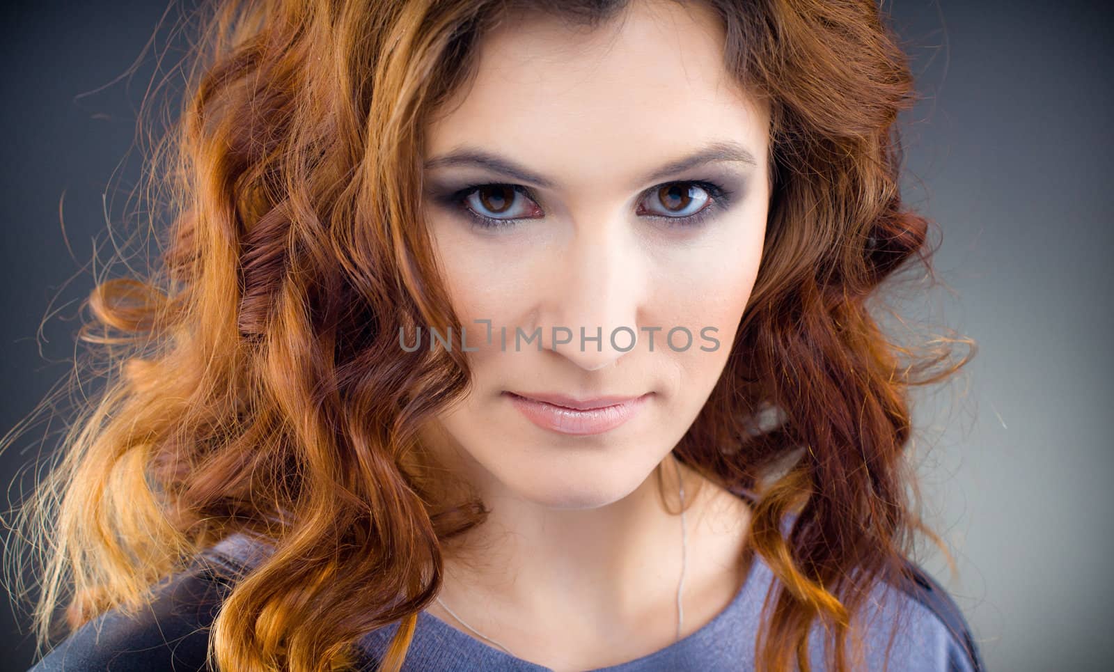 Close-up of Beautiful young woman with fashion make-up