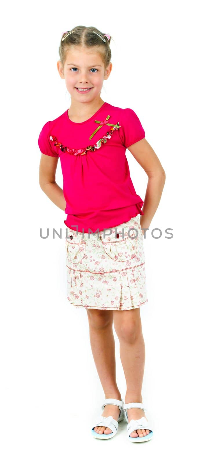 photo of cute little girl in colored clothes on white background by maxoliki