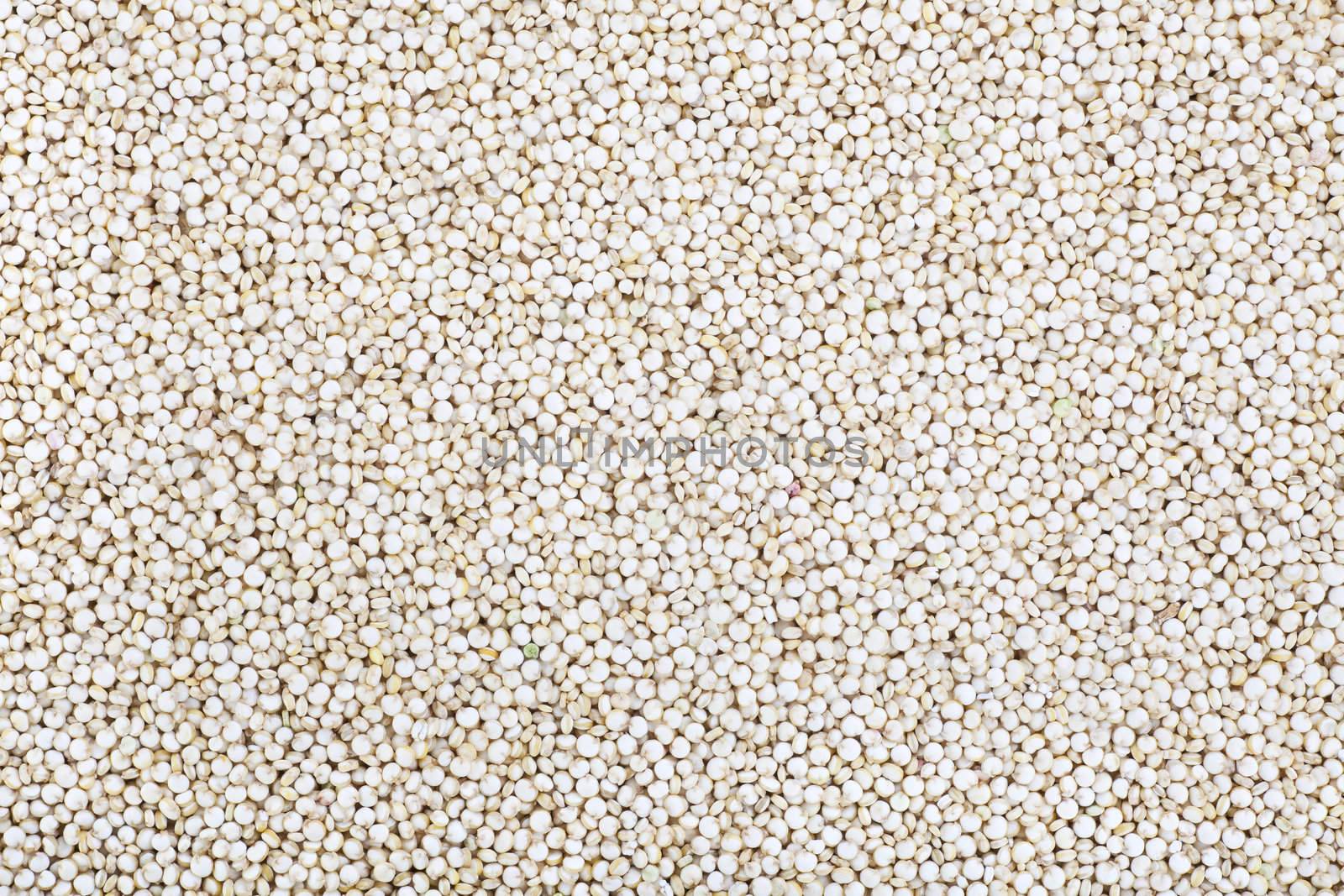 Healthy quinoa grain food background.