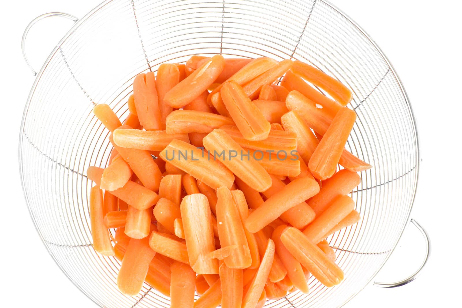 baby carrots split in half ready to be cooked